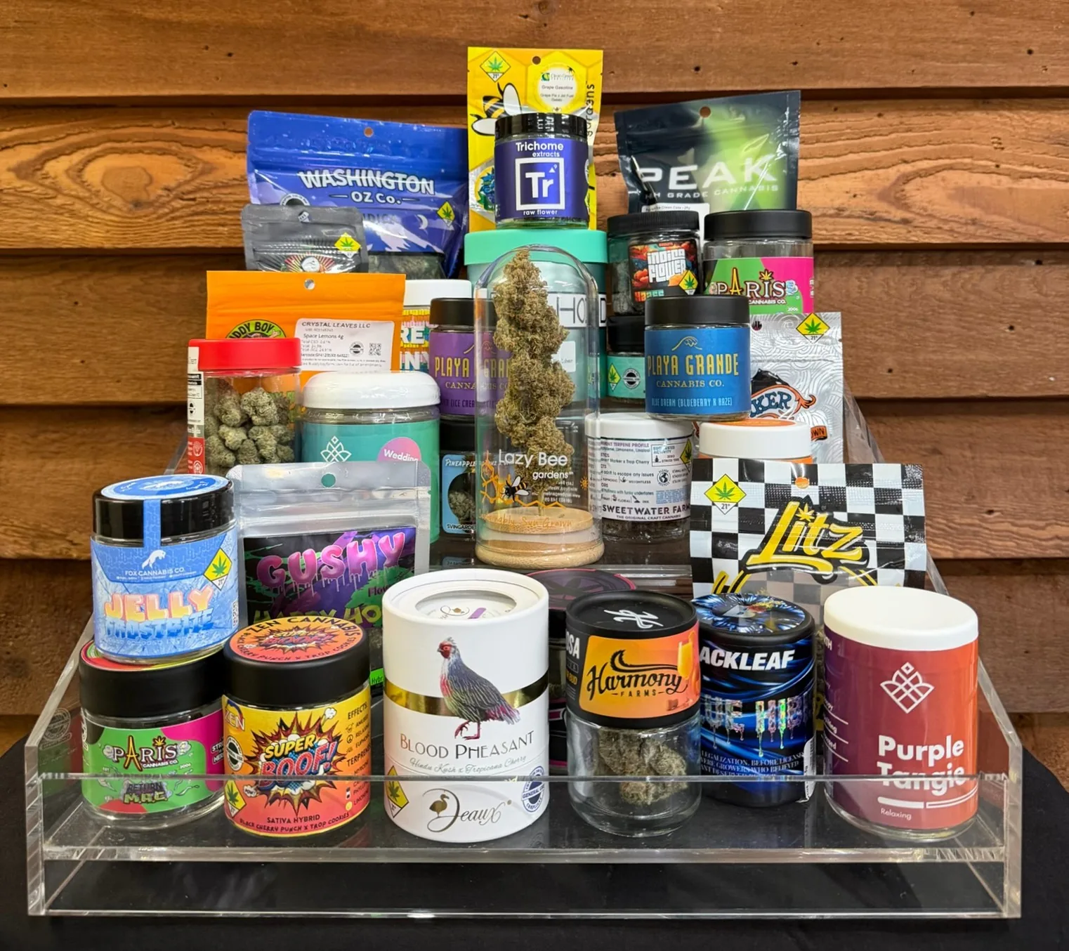 Cannabis flower jars and packages on display at Crystal Leaves in Spokane