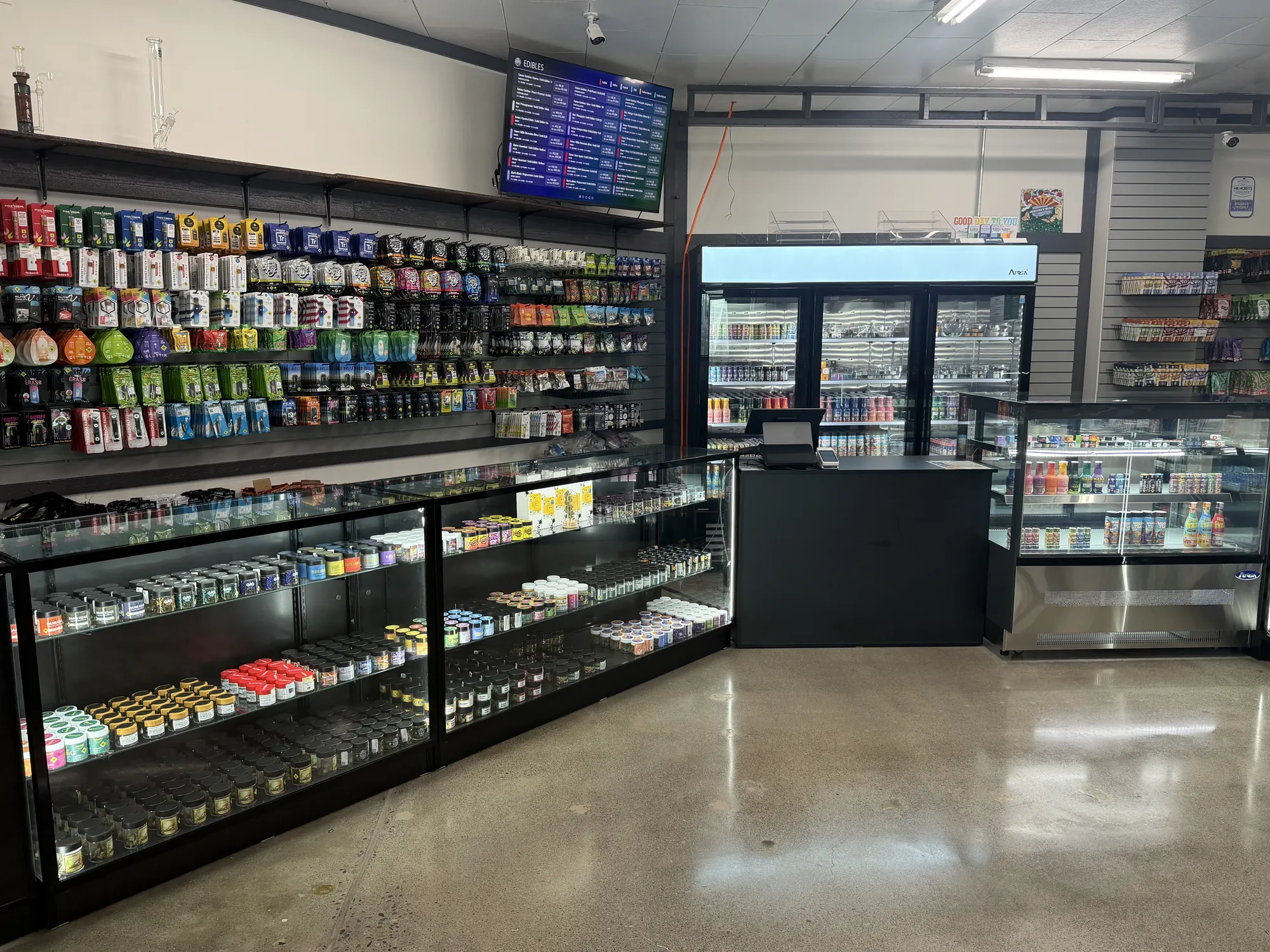 Glass display cases and product walls along the Crystal Leaves sales floor
