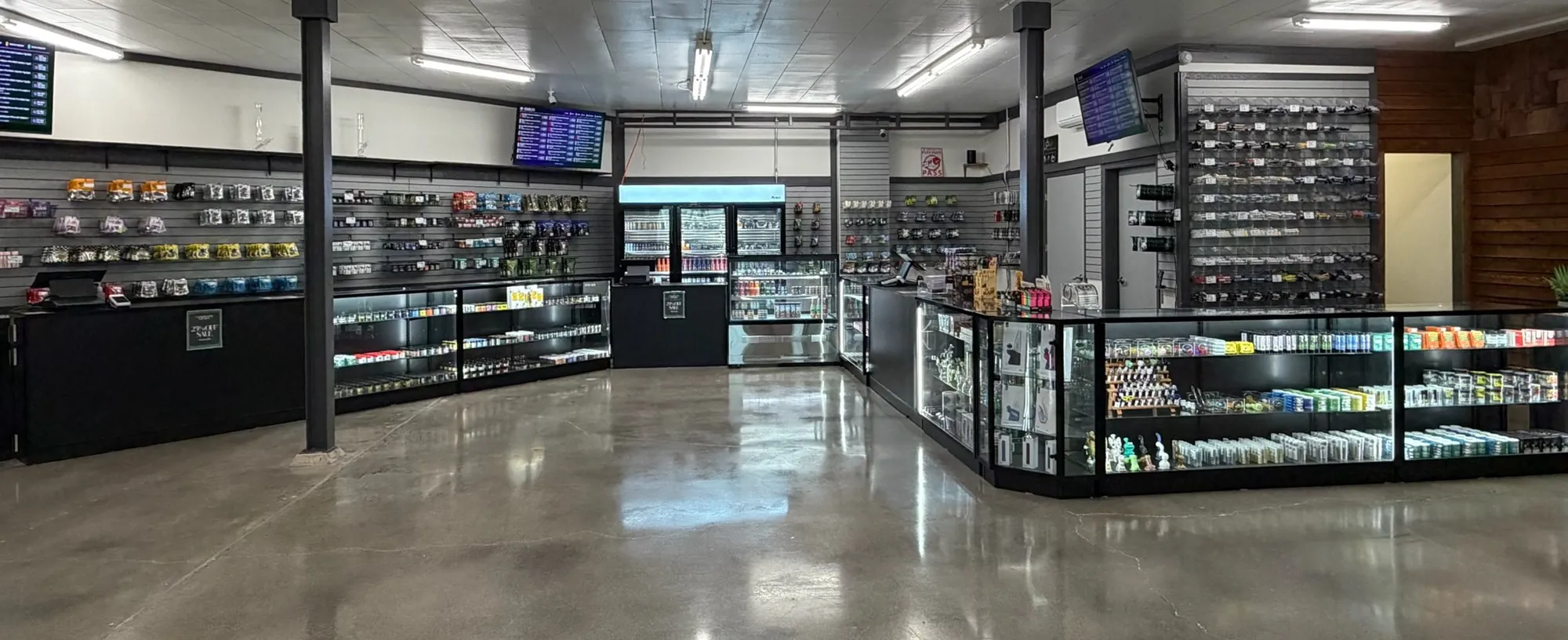 Wide view of the Crystal Leaves sales floor and display cases in Spokane