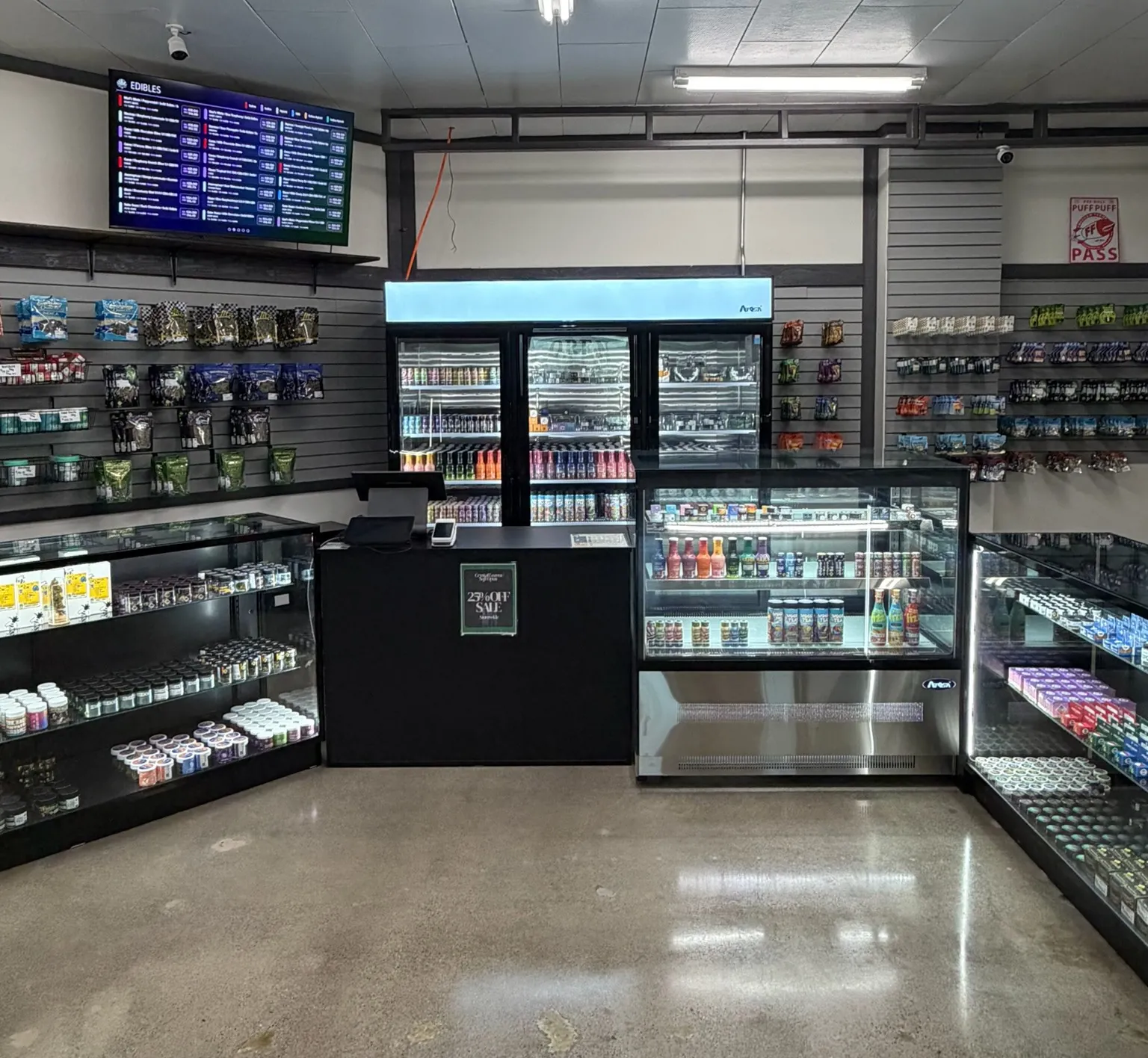 The Crystal Leaves checkout counter with drink coolers and display cases